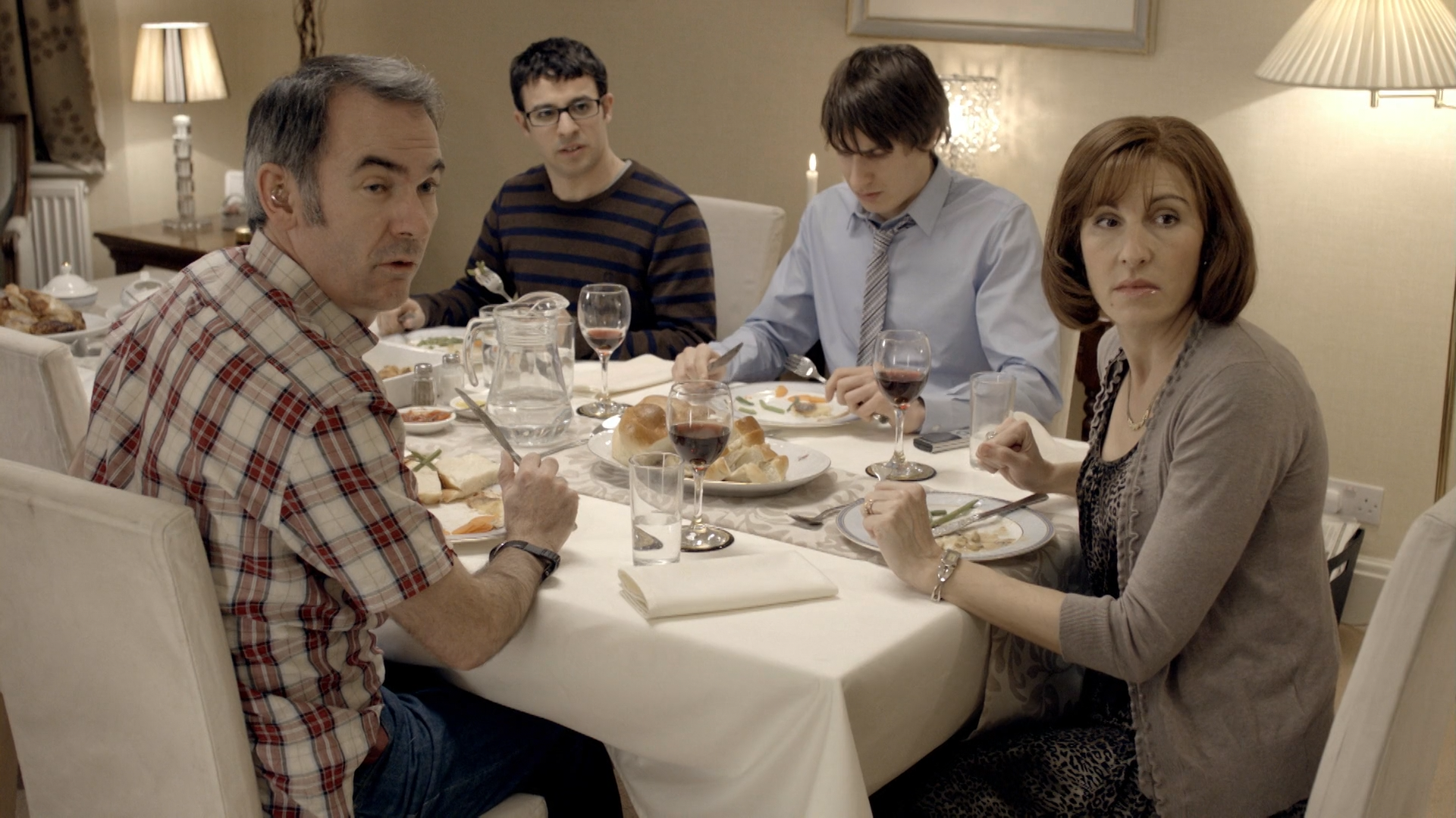 Friday.Night.Dinner.S01E01.The.Sofabed.1080p.WEB-DL.H.264.Rus.Eng-@EniaHD_0001.png
