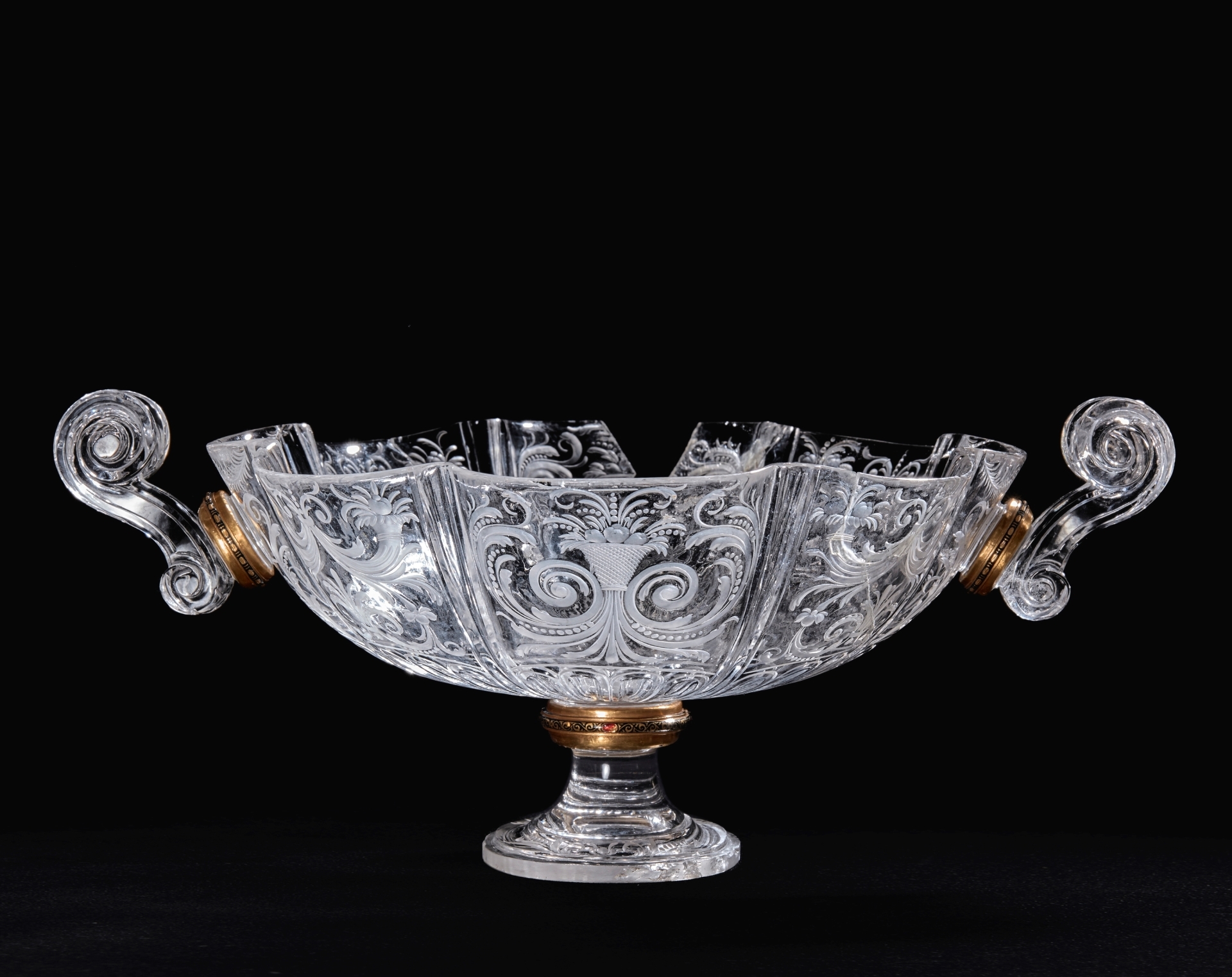 19 Rock crystal drinking vessel with stem motifs and scroll-shaped handles.jpg